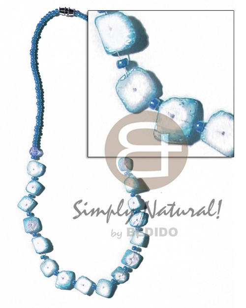 floating colored white rose in glass beads / subdued blue - Home