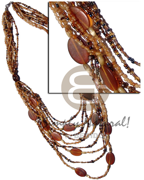 9 graduated layers of cut beads and amber carabao horn beads  matching amber horn flat oval accent / 34 in. - Home
