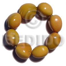 elastic 8 pcs. kukui nuts  bracelet / golden yellow - Home