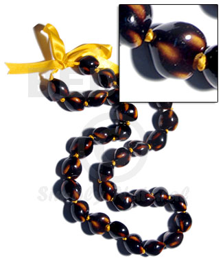 32 pcs. of kukui nuts in high polished paint gloss dark brown/yellow combination  in matching ribbon /lei / 36in - Home