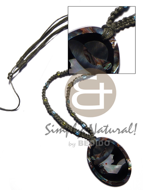 olive green macrame cord and 50mmx38mm oval pendant /elegant hat lady delicately etched in shells - brownlip, blacklip and paua combination in jet black laminated resin / 5mm thickness / adjustable - Home