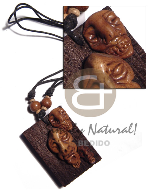 clay tribal mask on 60mmx40mm rectangular driftwood  /adjustable black wax cord /tribal clay series - Home