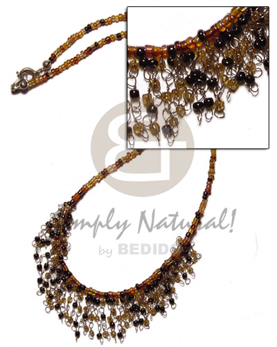 glass beads in light brown tones in metal looping - Home