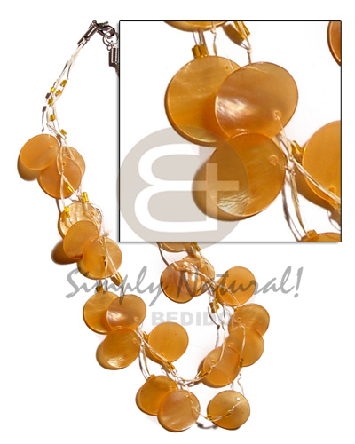 3 rows raffia in graduated length  21 pcs. round 18mm orange hammershell  and glass beads accent - Home