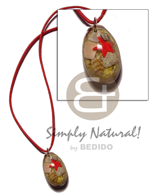 laminated cowrie shell pendant in wax cord - Home