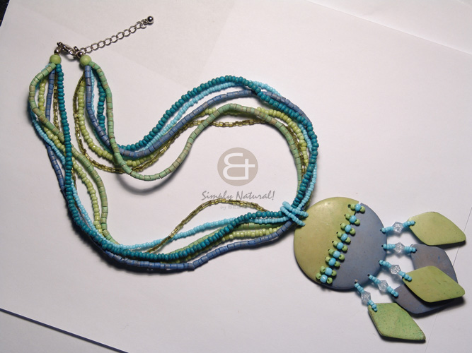 4 layers 2-3mm coco heishe/glass beads  45mm hammershell cracking in clear resin pendant / lime/pastel green tones - Home