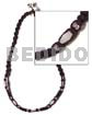 Troca beads in black macrame