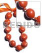 Kukui nuts in pearlized orange