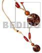 Round cowrie shell pendant
