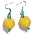 Dangling yellow kukui nuts