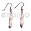 Dangling grinded puka earrings