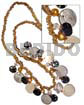 Golden glass beads dangling